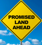 Promised land ahead sign